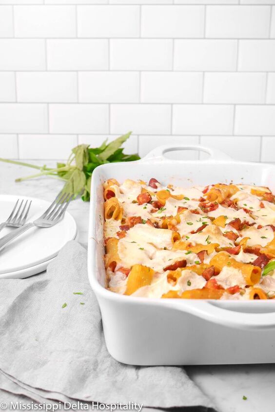 one pot cheesy baked rigatoni with andouille tomatoes and peppers