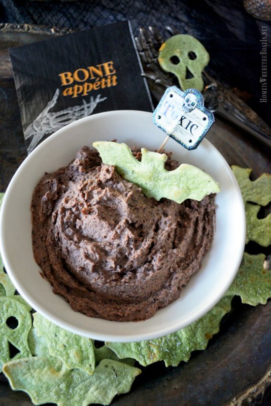 black bean and olive hummus with spooky spinach tortilla chips