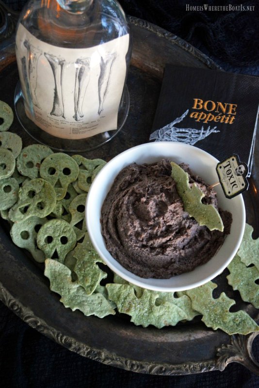 black bean and olive hummus with spooky spinach tortilla chips