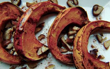 Roasted Carnival Squash Slices With Cinnamon and Chopped Chestnuts.