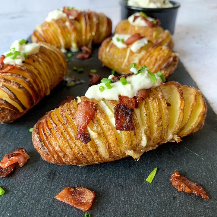 s 8 easy potato thanksgiving side dish recipes, Brie and Bacon Hasselback Potatoes