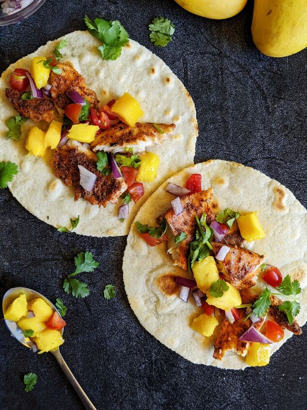 s 13 recipes to spice up taco tuesday dinners, Baked Fish Tacos With Mango Salsa Paleo