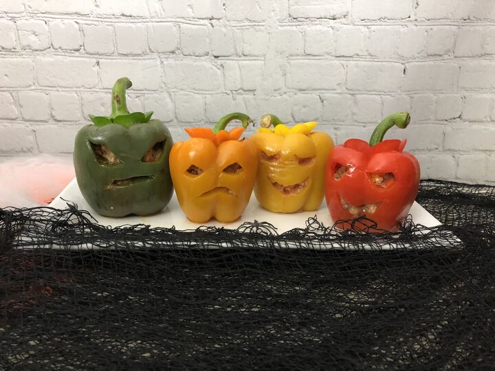 s 10 halloween treats that are even better than candy, Jack O Lantern Stuffed Peppers