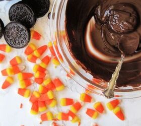 halloween chocolate covered oreos, Melted Chocolate Candy Corns and Oreo Cookie