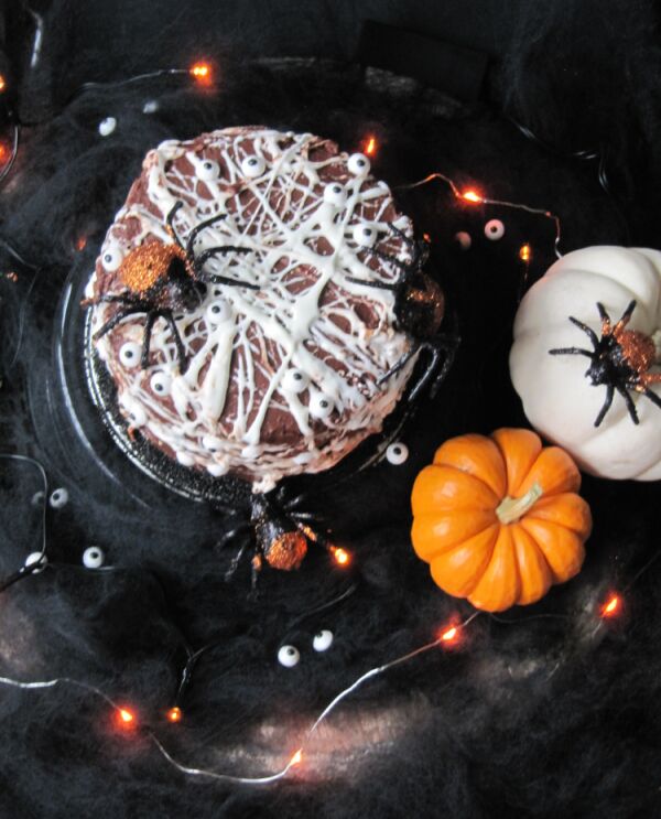 10 ghoulishly good main courses and desserts to haunt your taste buds, Marshmallow Spiderweb Hershey s Chocolate Cake for Halloween