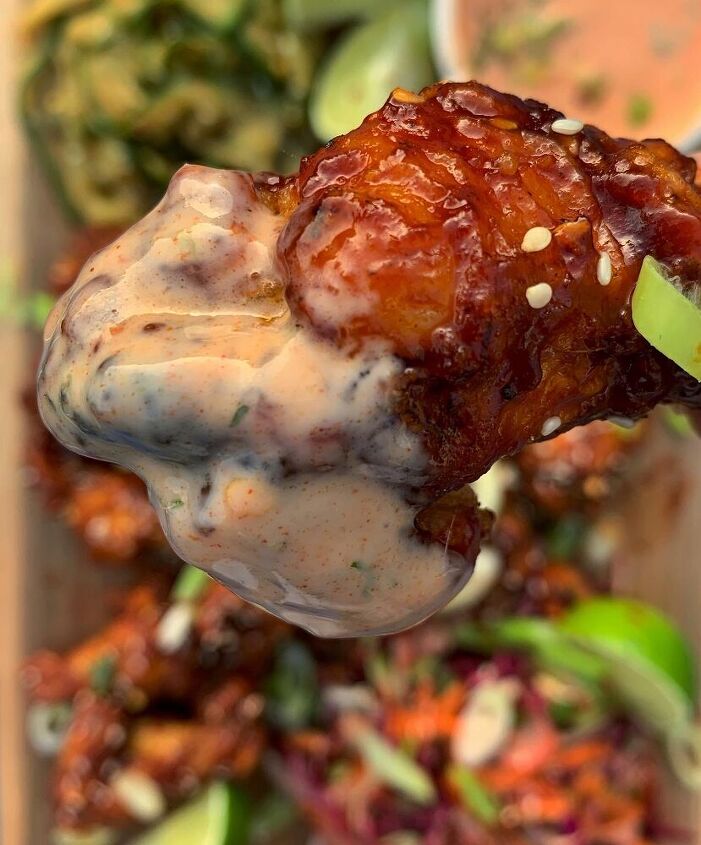 spicy korean wings with a buttermilk dressing and cucumber salad