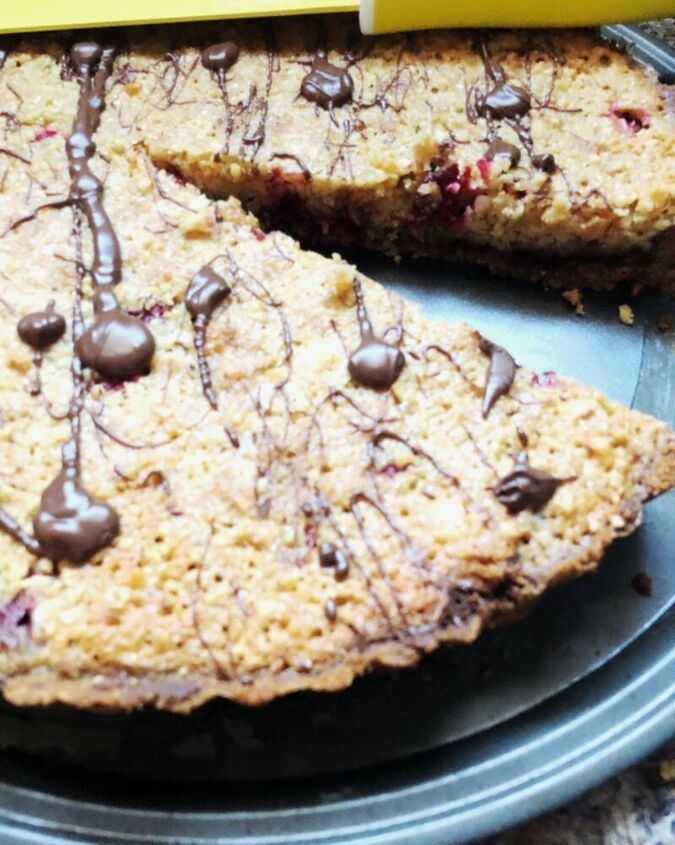 cranberry and hazelnut cream tart with ginger snap crust