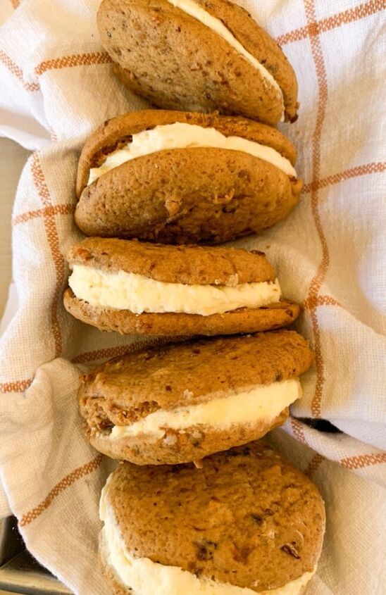 carrot cake sandwich cookies with cream cheese frosting
