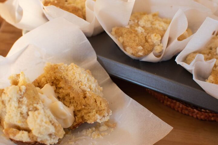 orange and cardamom bakery style streusel muffins with cream cheese
