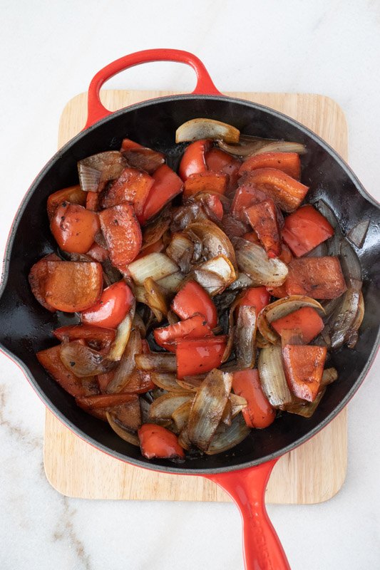 marinated sirloin steak tips with peppers and onions