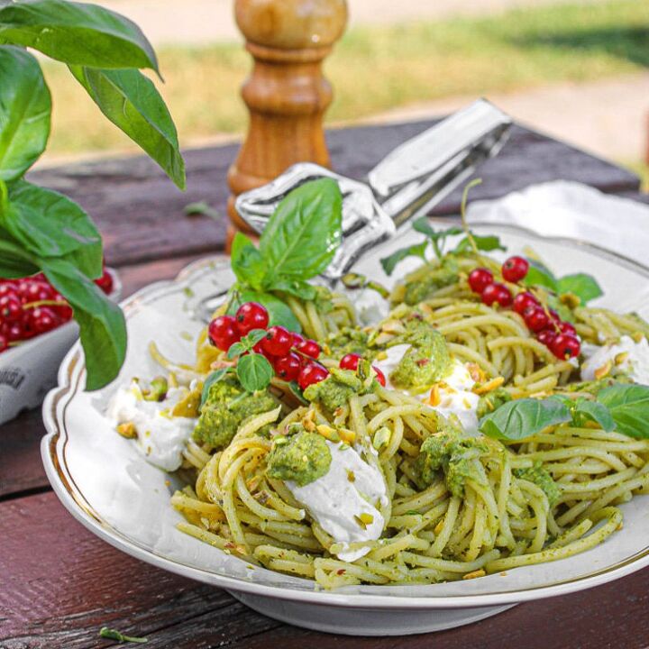 pistachio pesto spaghetti with whipped ricotta red curranth