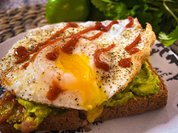 s 3 low calorie breakfast ideas that are delicious and nutritious, Lite Sunnyside Up Egg on Avocado Toast