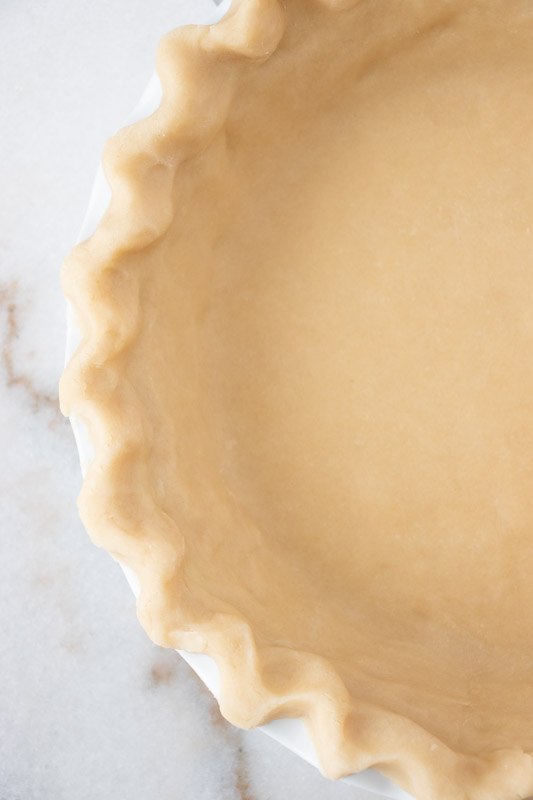 perfect pie crust, Finger and thumb pinch edge On the edge of the pie using your thumb press the dough in towards the middle of the pie and with the opposite hand s forefinger and thumb pinch the dough around your thumb
