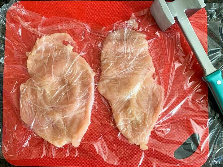 creamy chicken marsala, Raw pounded chicken on a cutting board