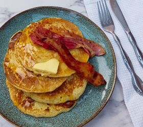 fluffy american style pancakes with maple syrup and bacon