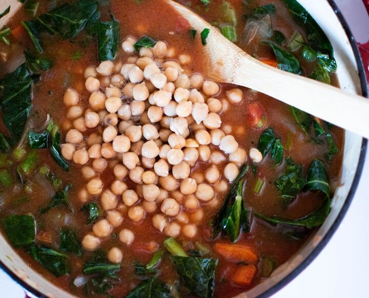 hearty and healthy vegetable soup with greens and chickpeas