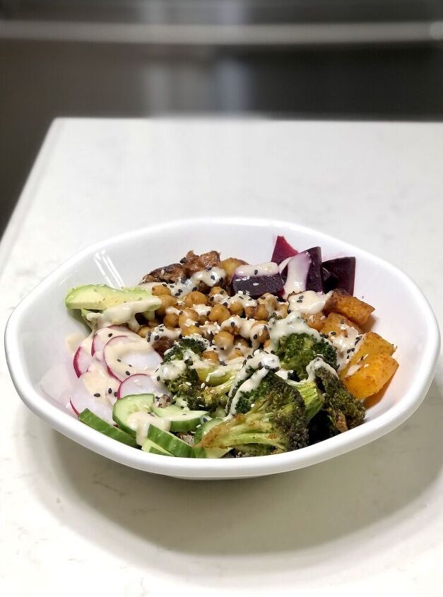 vegan protein bowl with roasted veggies and lemon garlic tahini