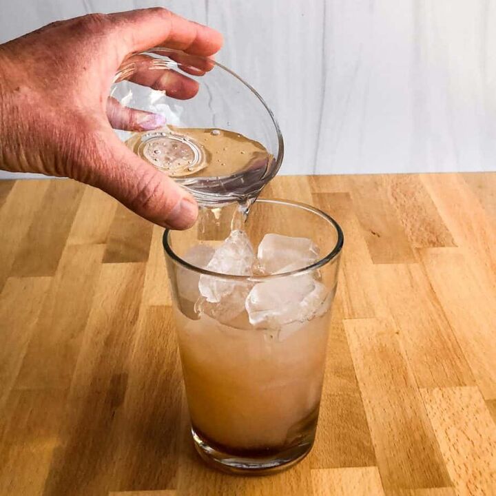 refreshing paloma cocktail, Pour in club soda and agave nectar