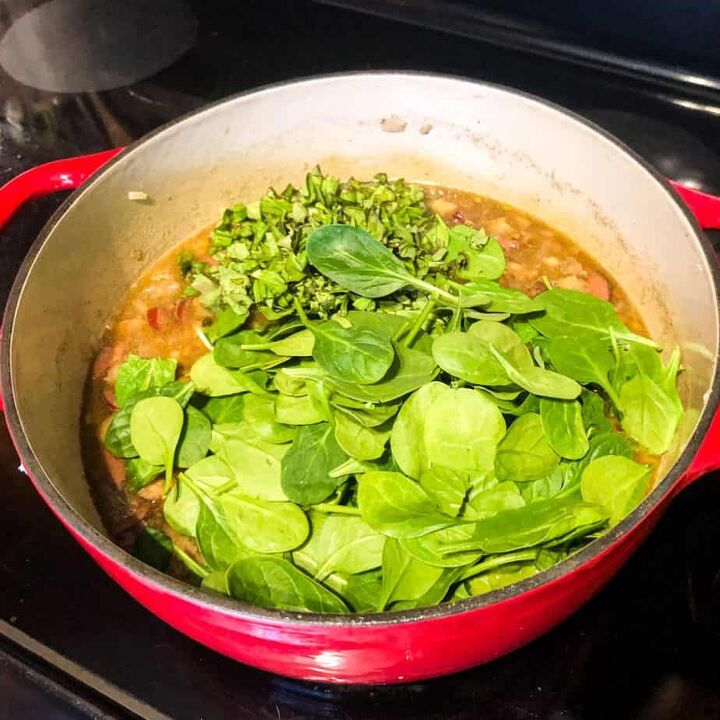 sausage lentil soup, Add the spinach and basil