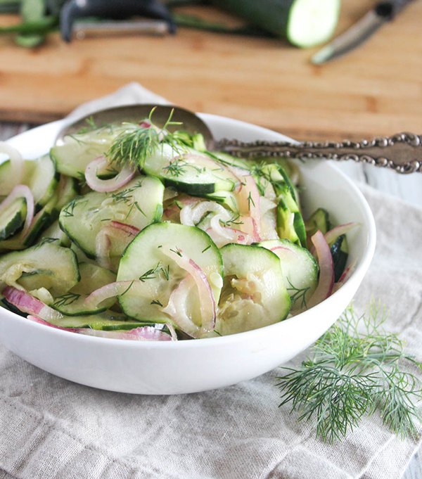 cucumbers and onions in vinegar