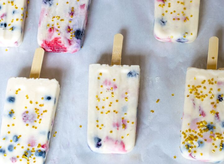 s 12 delicious red white and blue desserts for your july 4th bbq party, Red White and Blue Ice Cream Popsicles