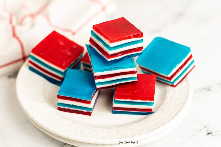 s 12 delicious red white and blue desserts for your july 4th bbq party, Red White and Blue Jello Ribbon Salad