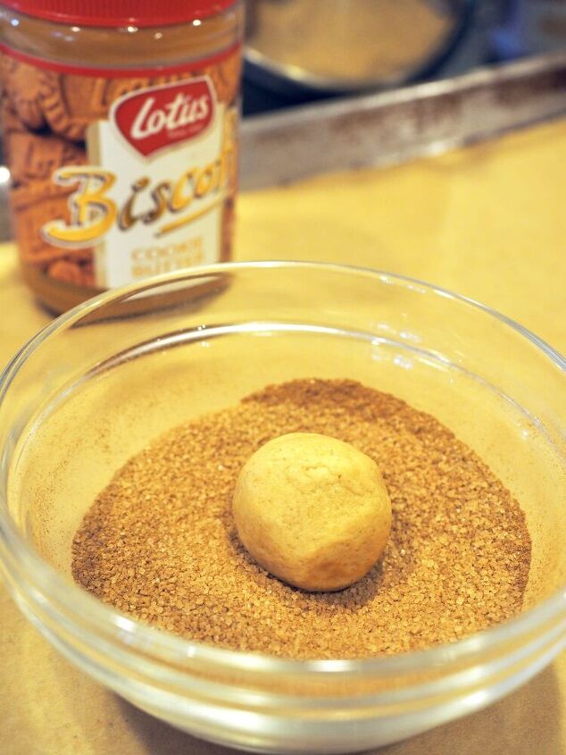 , Roll the cookie dough until completely covered in cinnamon sugar