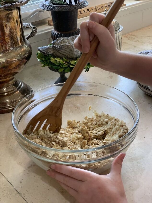 delicious blackberry cobbler, My granddaughter stirs the crumble mix