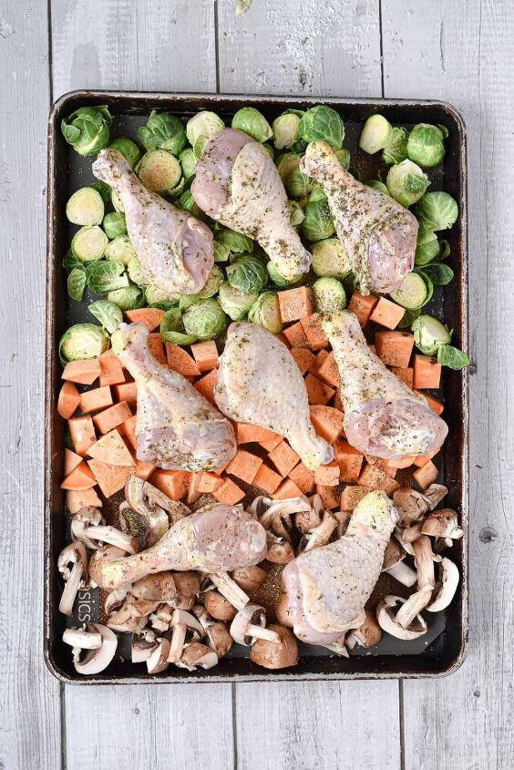 chicken drumstick sheet pan dinner, Top with the chicken and bake