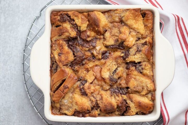 nutella banana brioche bread pudding, The top and sides are a crispy golden brown while the middle is a perfect custard swirl of brioche and Nutella
