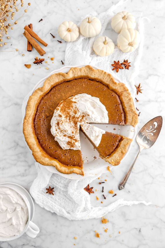 homemade pumpkin pie with pumpkin pie spiced whipped cream