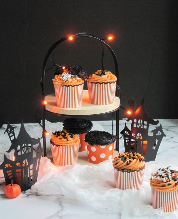 halloween pumpkin carrot cake cupcakes with buttercream icing and spri