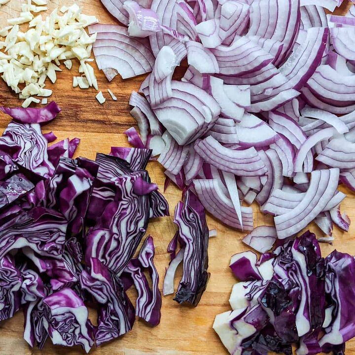 braised red cabbage with caraway seeds, Slice the onions and cabbage into strips
