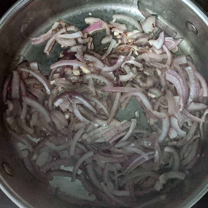 braised red cabbage with caraway seeds, Saut the onion and garlic over medium heat