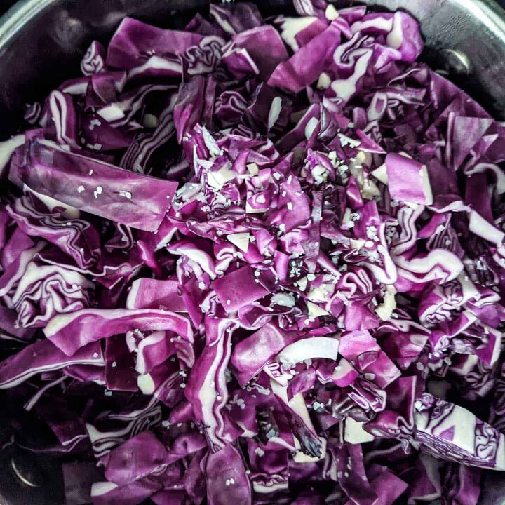 braised red cabbage with caraway seeds, Add the cabbage to the pan with a pinch of salt
