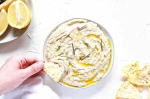 Add all ingredients into a food processor and blend until smooth—creamy dip should only take 30-60 seconds