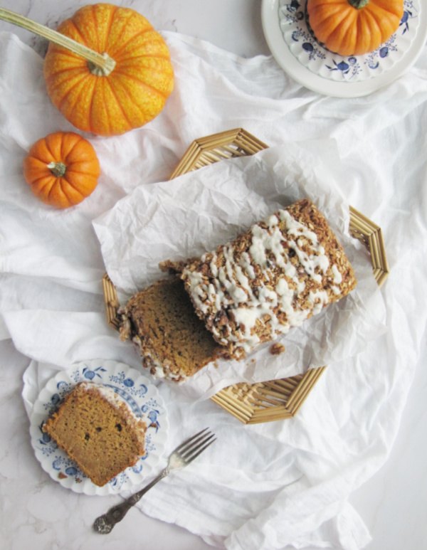 moist pumpkin bread with streusel topping and maple glaze