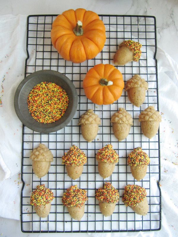maple spiced acorn cakes with maple glaze and fall sprinkles