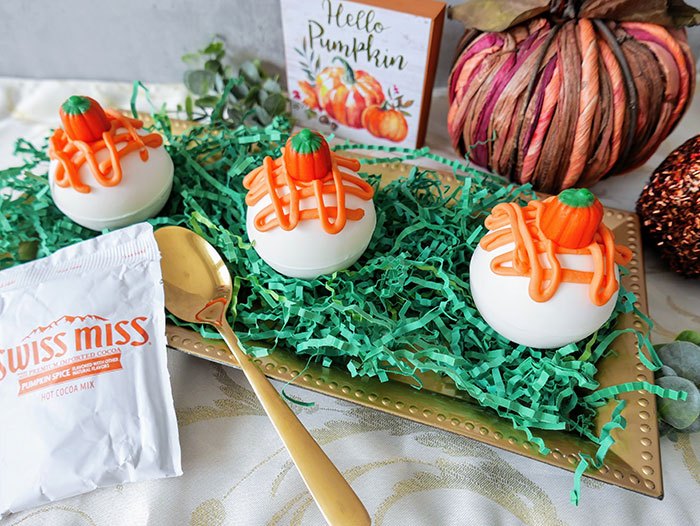 s 12 haunting halloween treats that your kids will love, Pumpkin Spice Hot Cocoa Bombs