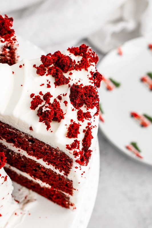 festive red velvet layer cake with peppermint cream cheese frosting