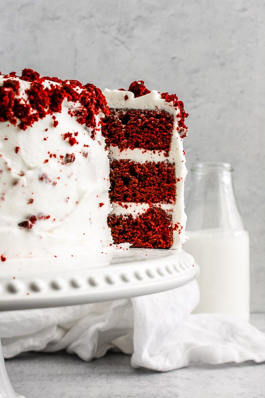 festive red velvet layer cake with peppermint cream cheese frosting