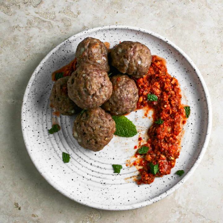 lamb meatballs with middle eastern inspired romesco