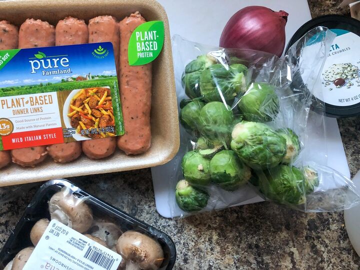 brussels sprout salad with plant based sausage and autumn flavors