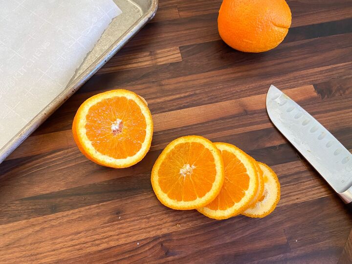 how to dry orange slices the kitchen garten, Sliced orange on countertop