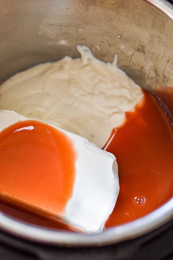 instant pot buffalo chicken dip, Add the cream cheese ranch and hot sauce to the Instant Pot