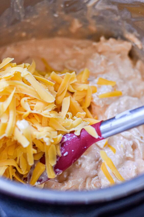 instant pot buffalo chicken dip, Add the shredded cheese