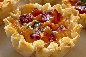 These easy-to-make bite-sized quiches are always a hit at a party or brunch