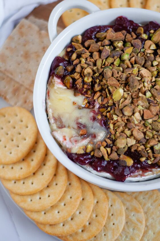 easy baked brie with raspberry jam and pistachios