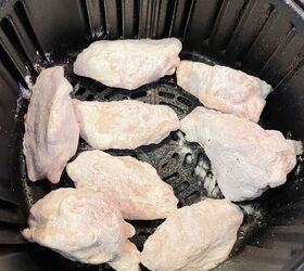 air fryer frozen chicken wings, Place the chicken wings in a greased air fryer basket