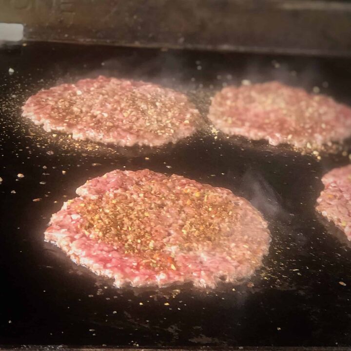 delicious smash burgers on the griddle